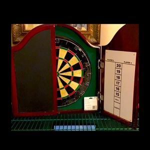 Dart board in cabinet